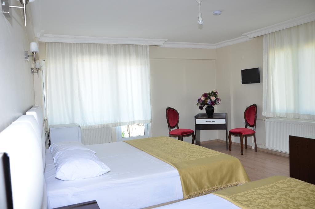 Uzunhan Hotel Ayvalik Quarto foto
